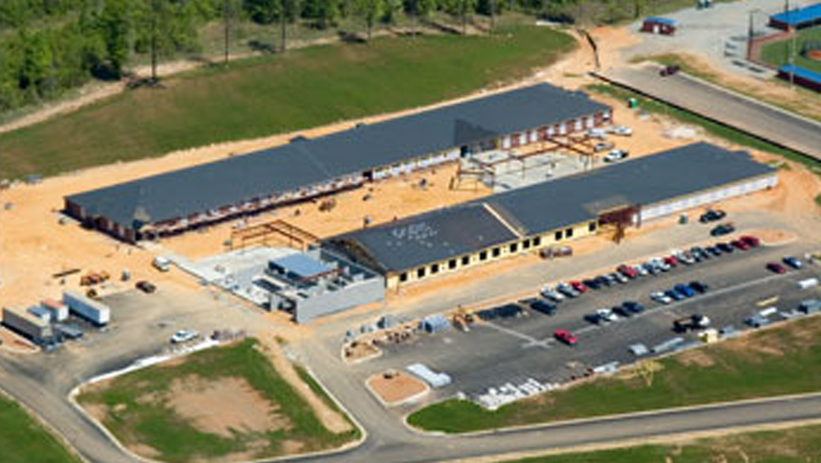 Projects: Aerial view of elementary school buildings under construction